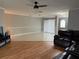 Bright living room with tile and wood floors, lots of natural light at 3544 Snowy Egret Ct, Palm Harbor, FL 34683