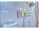 Small bathroom with white vanity and shower at 37350 Tropical Dr, Zephyrhills, FL 33541