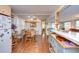 View of dining area, kitchen, and living room at 37350 Tropical Dr, Zephyrhills, FL 33541