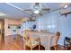 Cozy dining area with table and chairs adjacent to the kitchen at 37350 Tropical Dr, Zephyrhills, FL 33541