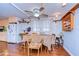 Bright dining room features a table and chairs near the kitchen at 37350 Tropical Dr, Zephyrhills, FL 33541