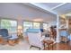 Living room with rocking chair and neutral color scheme at 37350 Tropical Dr, Zephyrhills, FL 33541