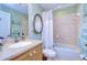 Bathroom with single vanity and tub shower combo at 38902 Inez Ave, Zephyrhills, FL 33542