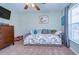 Bedroom with daybed and ceiling fan at 38902 Inez Ave, Zephyrhills, FL 33542