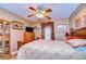 Cozy bedroom with wood flooring and ceiling fan at 38902 Inez Ave, Zephyrhills, FL 33542