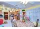 Bright dining area with a table and chairs near the kitchen at 38902 Inez Ave, Zephyrhills, FL 33542