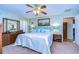 Relaxing main bedroom with a king-size bed and beach decor at 38902 Inez Ave, Zephyrhills, FL 33542