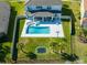 Home with pool, patio, and basketball hoop in backyard at 3898 Barbour Trail, Odessa, FL 33556