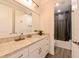 Modern bathroom with white cabinets and granite countertop at 3898 Barbour Trail, Odessa, FL 33556