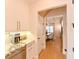 Bright kitchen with marble countertops and wooden accents at 3898 Barbour Trail, Odessa, FL 33556