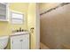 Nice bathroom with walk-in shower and neutral tile at 4424 W Bay Villa Ave, Tampa, FL 33611