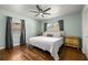 Spacious bedroom with hardwood floors and large windows at 4424 W Bay Villa Ave, Tampa, FL 33611