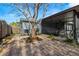 Large patio with pavers, screened porch, and grill at 4424 W Bay Villa Ave, Tampa, FL 33611