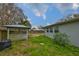 Backyard view showing a gazebo and side of house at 4619 W Bay Villa Ave, Tampa, FL 33611