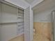 Bathroom with toilet and built-in shelving at 4619 W Bay Villa Ave, Tampa, FL 33611