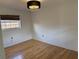 Bright bedroom with hardwood floors and window coverings at 4619 W Bay Villa Ave, Tampa, FL 33611