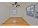 Bright bedroom with hardwood floors and large windows at 4619 W Bay Villa Ave, Tampa, FL 33611