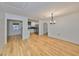 Bright dining room with hardwood floors and chandelier at 4619 W Bay Villa Ave, Tampa, FL 33611