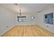 Bright dining room with hardwood floors and window at 4619 W Bay Villa Ave, Tampa, FL 33611