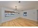 Bright dining room with hardwood floors and window at 4619 W Bay Villa Ave, Tampa, FL 33611