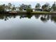 Peaceful waterfront view showcasing neighboring homes and boats at 4919 Shore Acres Ne Blvd, St Petersburg, FL 33703