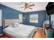 Spacious bedroom with wood floors and ceiling fan at 5004 Osprey Ln, New Port Richey, FL 34652