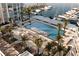 Resort-style pool and sundeck with ample lounge chairs at 5120 Marina Way # 21406, Tampa, FL 33611