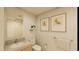 Modern bathroom with floating vanity and neutral color palette at 5120 Marina Way # 21501, Tampa, FL 33611