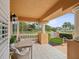 Outdoor patio with table and chairs, featuring a view of grass at 595 5Th Ne Ave, St Petersburg, FL 33701