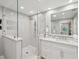 Modern shower with frameless glass enclosure and walk-in design at 595 5Th Ne Ave, St Petersburg, FL 33701