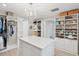 Spacious walk-in closet with custom built-ins and island at 595 5Th Ne Ave, St Petersburg, FL 33701