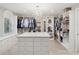 Large walk-in closet with abundant storage, custom shelving, and hanging space at 595 5Th Ne Ave, St Petersburg, FL 33701