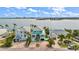 Three waterfront homes with driveways, offering stunning water views at 644 Boca Ciega Isle Dr, St Pete Beach, FL 33706