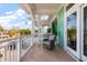 Spacious balcony overlooking the street and offering plenty of seating at 644 Boca Ciega Isle Dr, St Pete Beach, FL 33706