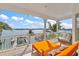 Relaxing balcony with water views and outdoor seating at 644 Boca Ciega Isle Dr, St Pete Beach, FL 33706