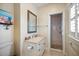 Clean bathroom with a walk-in shower and vanity at 644 Boca Ciega Isle Dr, St Pete Beach, FL 33706