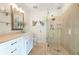 Elegant bathroom with a large walk-in shower and modern vanity at 644 Boca Ciega Isle Dr, St Pete Beach, FL 33706