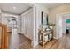 Bright and spacious entryway with hardwood floors and decorative accents at 644 Boca Ciega Isle Dr, St Pete Beach, FL 33706