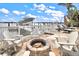 Cozy fire pit area overlooking the water at 644 Boca Ciega Isle Dr, St Pete Beach, FL 33706