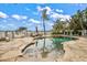 Inviting pool with flagstone patio, offering water views and lounge chairs at 644 Boca Ciega Isle Dr, St Pete Beach, FL 33706