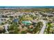 Community overview, showing homes, pool, and park at 6834 Blue Moon Way, Sun City Center, FL 33573