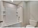 Clean bathroom with shower/tub combo and tile flooring at 6834 Blue Moon Way, Sun City Center, FL 33573