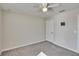 Bright bedroom with ceiling fan and carpet flooring at 6834 Blue Moon Way, Sun City Center, FL 33573