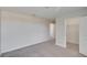 Simple bedroom with closet and carpet flooring at 6834 Blue Moon Way, Sun City Center, FL 33573