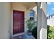 Exterior front door entry to a two story house at 6834 Blue Moon Way, Sun City Center, FL 33573