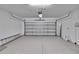 Attached garage with automatic door opener at 6834 Blue Moon Way, Sun City Center, FL 33573