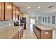 Modern kitchen with granite countertops and ample cabinetry at 6834 Blue Moon Way, Sun City Center, FL 33573