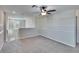 Spacious upstairs loft area with ceiling fan, perfect for a home office or extra living space at 6834 Blue Moon Way, Sun City Center, FL 33573