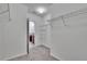 Large walk-in closet with wire shelving at 6834 Blue Moon Way, Sun City Center, FL 33573