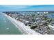 Aerial view of beach, ocean and residential buildings at 6950 113Th St, Seminole, FL 33772